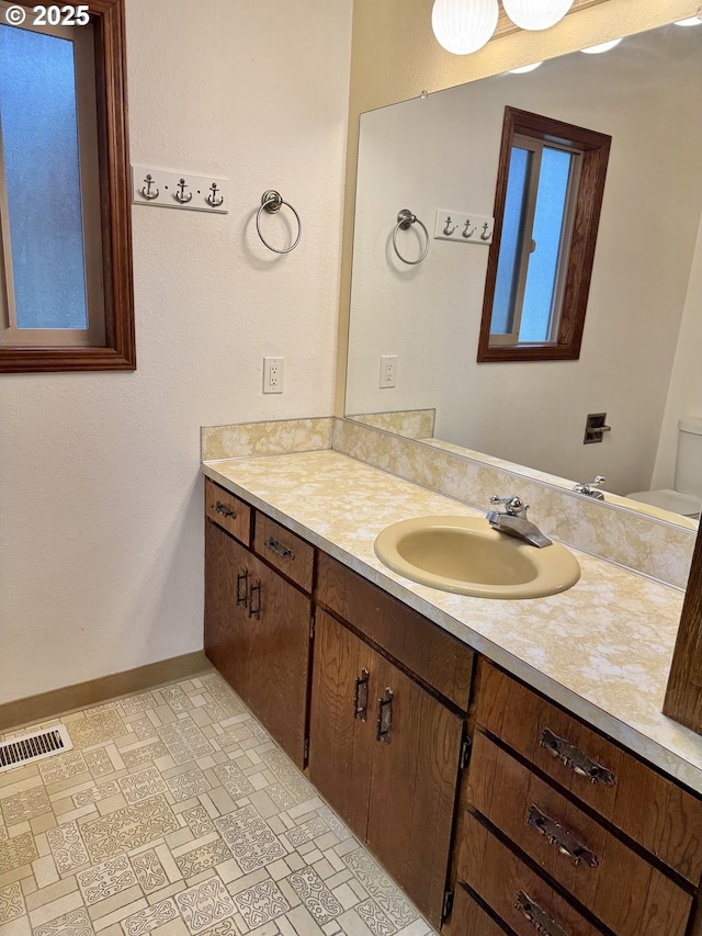 15400 SE Barlow Ct, Damascus, OR 97089 - bathroom featuring vanity and baseboards