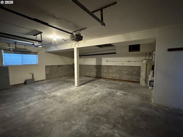 15400 SE Barlow Ct, Damascus, OR 97089 - garage with a garage door opener and water heater