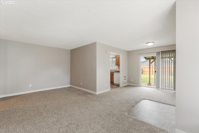 911 W Charles St, Newberg, OR 97132 - spare room featuring light colored carpet and baseboards