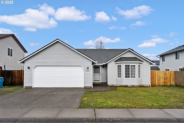 ranch-style house with a garage, fence, aphalt driveway, and a front yard