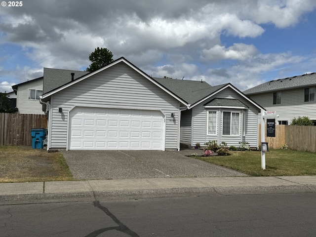 16308 NE 71st St, Vancouver, WA 98682 - view of front of house featuring a garage, asphalt driveway, and roof with shingles