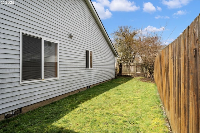 view of yard featuring a fenced backyard