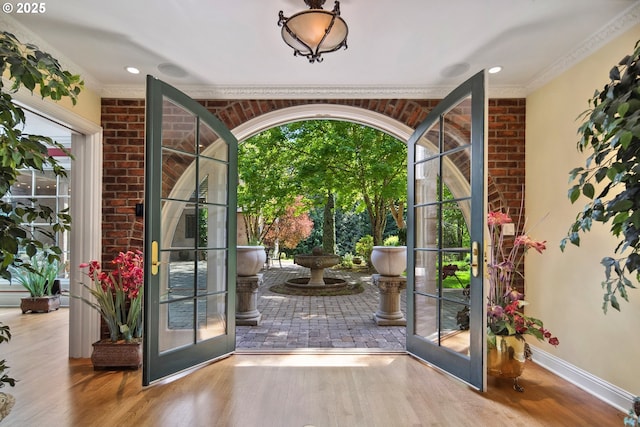 1500 SE Waverly Dr, Milwaukie, OR 97222 - doorway featuring french doors, wood finished floors, and baseboards