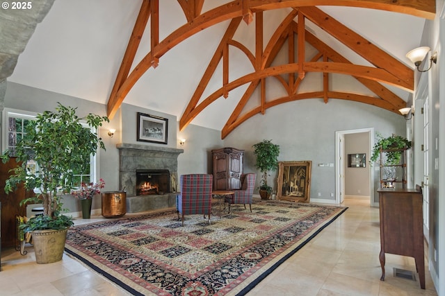 1500 SE Waverly Dr, Milwaukie, OR 97222 - living room featuring high vaulted ceiling, a lit fireplace, and beam ceiling