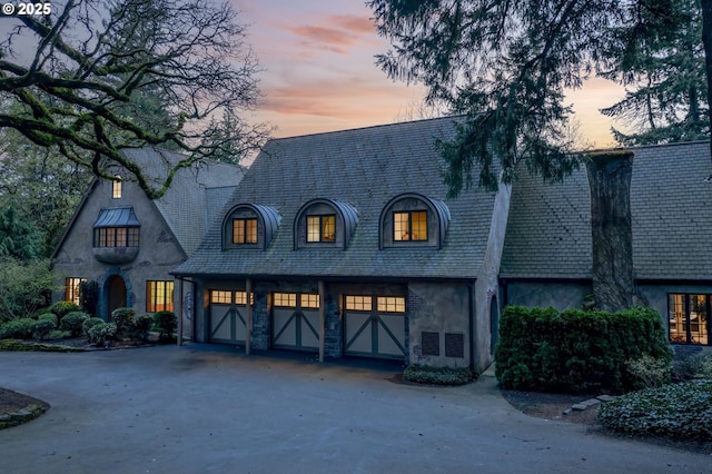 1500 SE Waverly Dr, Milwaukie, OR 97222 - french country style house with driveway, stone siding, and stucco siding