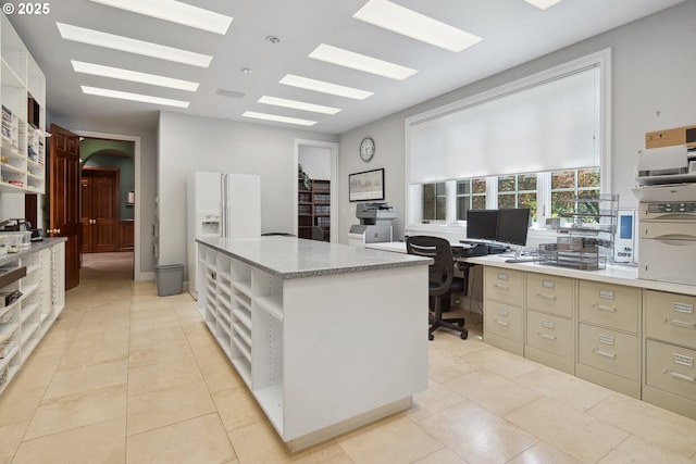 1500 SE Waverly Dr, Milwaukie, OR 97222 - office area with light tile patterned flooring and arched walkways