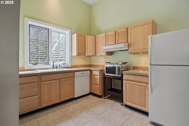 1500 SE Waverly Dr, Milwaukie, OR 97222 - kitchen featuring white appliances, light brown cabinets, under cabinet range hood, a sink, and a high ceiling