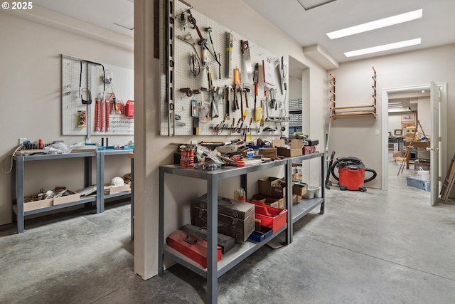 1500 SE Waverly Dr, Milwaukie, OR 97222 - miscellaneous room with a workshop area and concrete flooring
