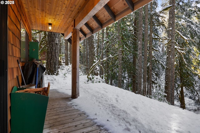 view of snow covered deck