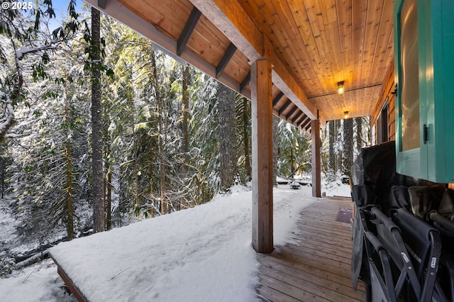 view of snow covered deck