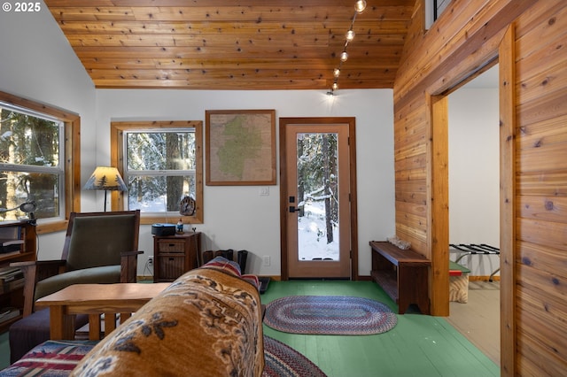 entrance foyer featuring lofted ceiling, wood-type flooring, and wood ceiling