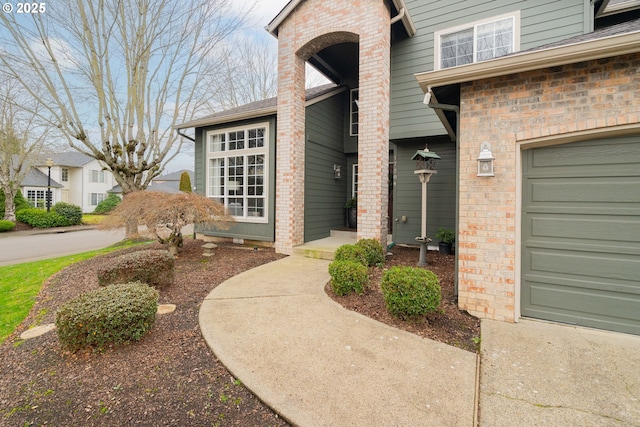 entrance to property featuring a garage