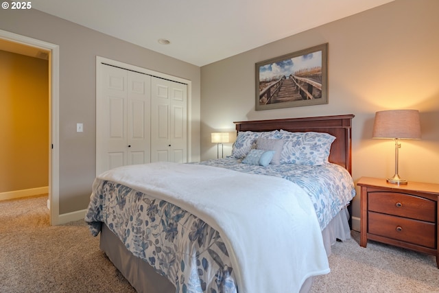 carpeted bedroom with a closet