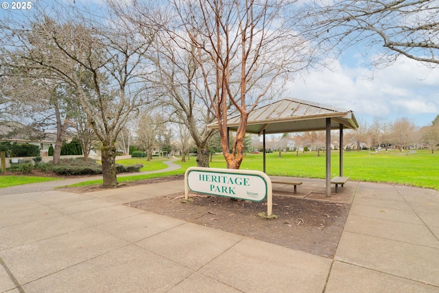 view of property's community featuring a yard and a gazebo