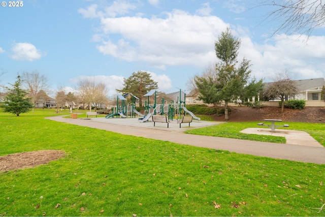 view of playground with a yard