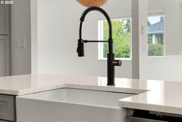 657 Summit Ave, Gearhart, OR 97138 - kitchen view of a sink and light stone counters
