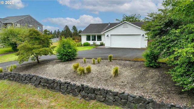 657 Summit Ave, Gearhart, OR 97138 - view of front of house featuring an attached garage and driveway