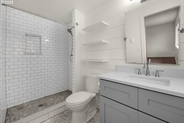 657 Summit Ave, Gearhart, OR 97138 - full bathroom featuring toilet, vanity, a tile shower, and tile patterned flooring