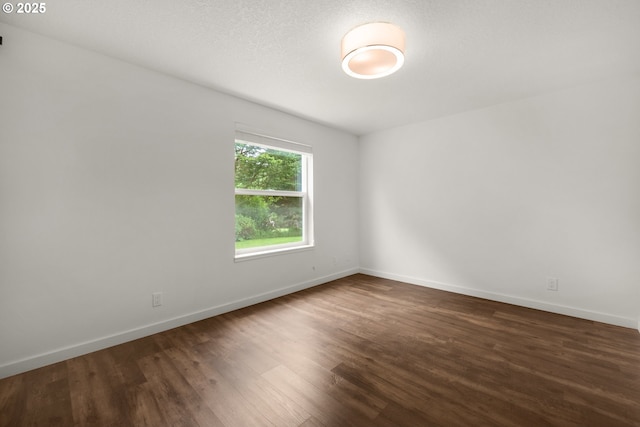 657 Summit Ave, Gearhart, OR 97138 - unfurnished room featuring wood finished floors and baseboards