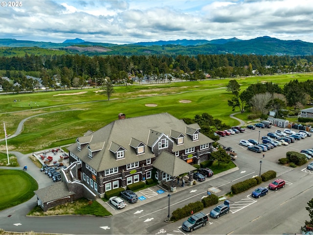 657 Summit Ave, Gearhart, OR 97138 - bird's eye view of a mountainous background, a golf club, and a heavily wooded area