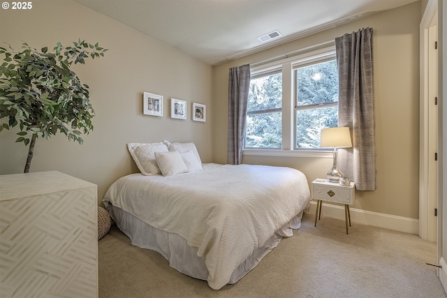21540 SW 110th Pl, Tualatin, OR 97062 - bedroom featuring light carpet and baseboards