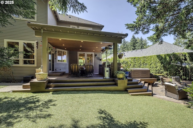 21540 SW 110th Pl, Tualatin, OR 97062 - back of property featuring a deck, a yard, and french doors