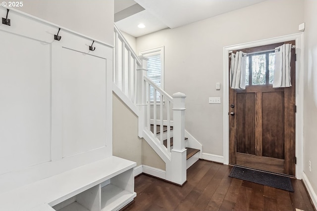 mudroom with dark wood-type flooring