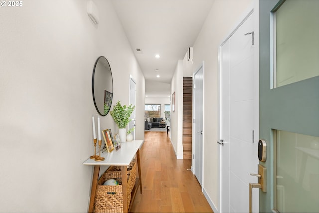 hall with light wood-type flooring