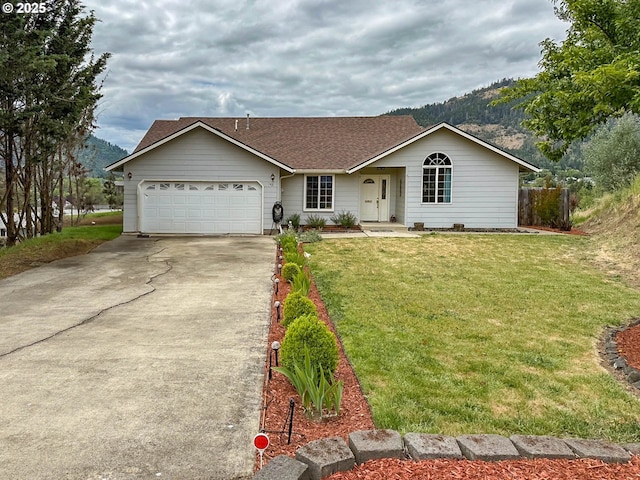 142 NE Stevenson Ct, Myrtle Creek, OR 97457 - single story home featuring an attached garage, driveway, and a shingled roof