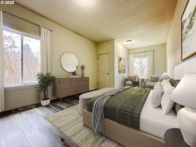 bedroom featuring hardwood / wood-style flooring