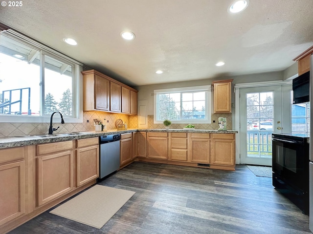 kitchen featuring sink, black appliances, a textured ceiling, dark hardwood / wood-style floors, and backsplash