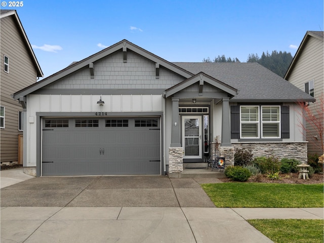 craftsman inspired home with a garage