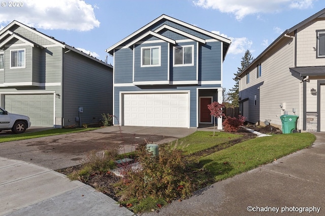 view of front of house featuring a garage and concrete driveway