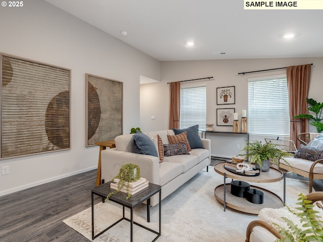 kitchen with light countertops, visible vents, dark wood finished floors, appliances with stainless steel finishes, and a sink
