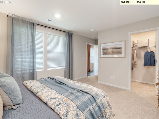 bedroom with light carpet