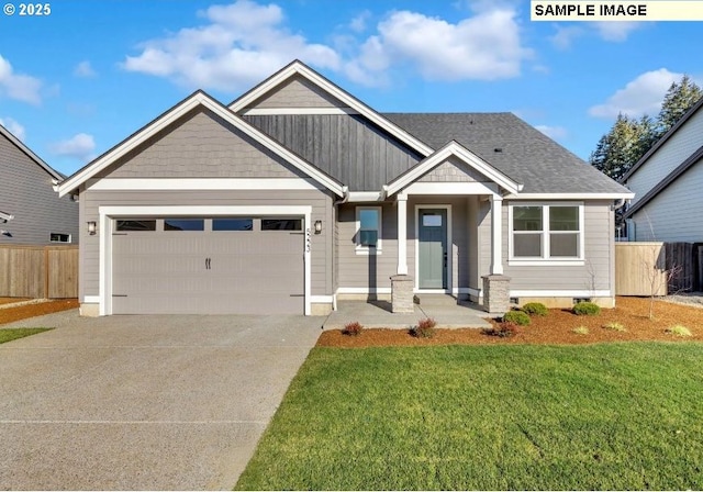 craftsman-style house with a garage and a front yard