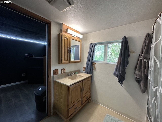 440 N Mountain Blvd, Mount Vernon, OR 97865 - bathroom with vanity and a textured ceiling