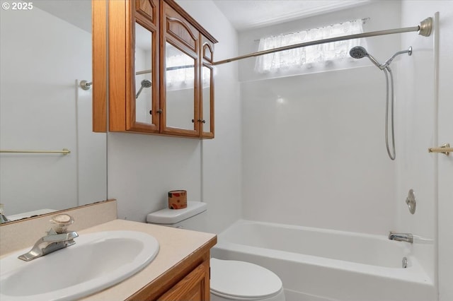full bathroom with toilet, bathing tub / shower combination, and vanity