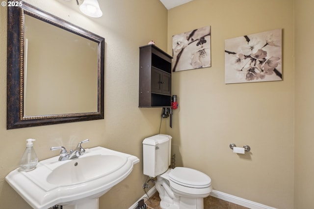 1145 NW 22nd Ave, Camas, WA 98607 - half bath with a sink, baseboards, toilet, and tile patterned flooring