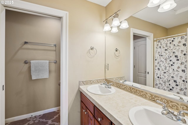 1145 NW 22nd Ave, Camas, WA 98607 - full bath featuring double vanity, a shower with curtain, and baseboards