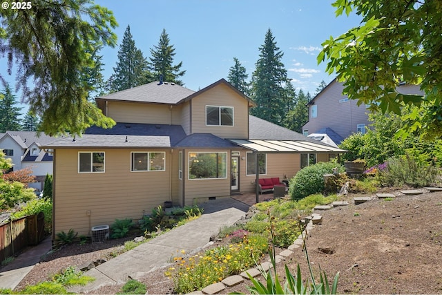 1145 NW 22nd Ave, Camas, WA 98607 - view of front of house featuring outdoor lounge area, a patio, a shingled roof, and crawl space