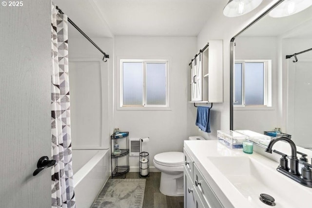3060 Pine St, North Bend, OR 97459 - bathroom with vanity, shower / bathtub combination with curtain, toilet, wood finished floors, and baseboards