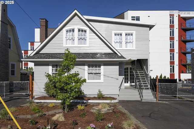 2125 NE 48th Ave, Portland, OR 97213 - view of front of house featuring a shingled roof and stairway