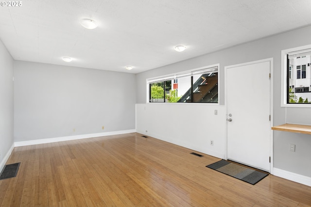 2125 NE 48th Ave, Portland, OR 97213 - unfurnished room featuring wood finished floors and baseboards