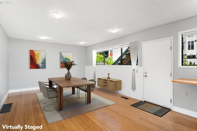 2125 NE 48th Ave, Portland, OR 97213 - dining space featuring wood finished floors and baseboards