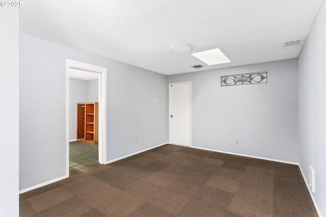 2125 NE 48th Ave, Portland, OR 97213 - carpeted empty room featuring a textured ceiling and baseboards