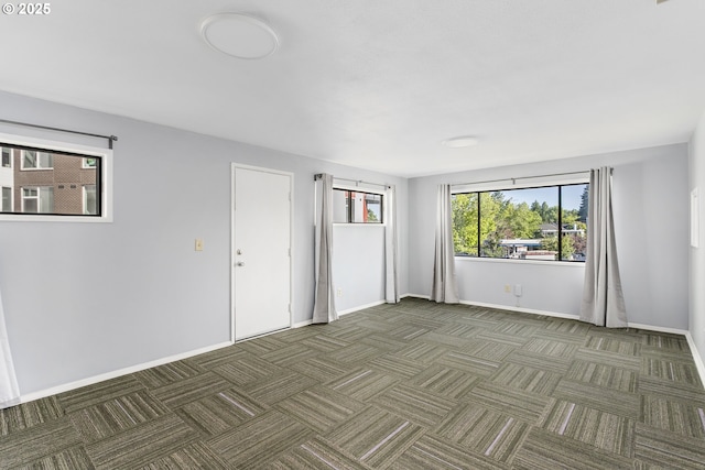 2125 NE 48th Ave, Portland, OR 97213 - empty room featuring baseboards and carpet flooring