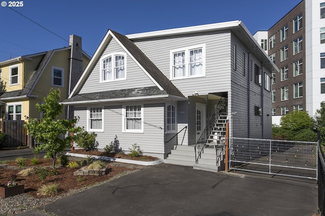 2125 NE 48th Ave, Portland, OR 97213 - view of front of house featuring roof with shingles and stairs