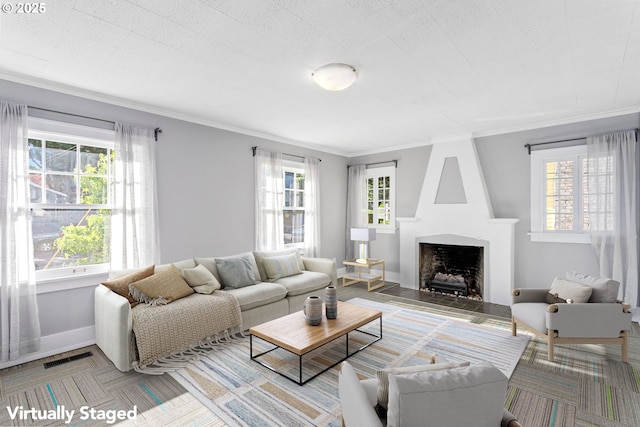 2125 NE 48th Ave, Portland, OR 97213 - living area with baseboards, a large fireplace, and ornamental molding