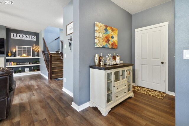 4219 NE 157th Ct, Vancouver, WA 98682 - hall featuring stairway, dark wood-style flooring, and baseboards